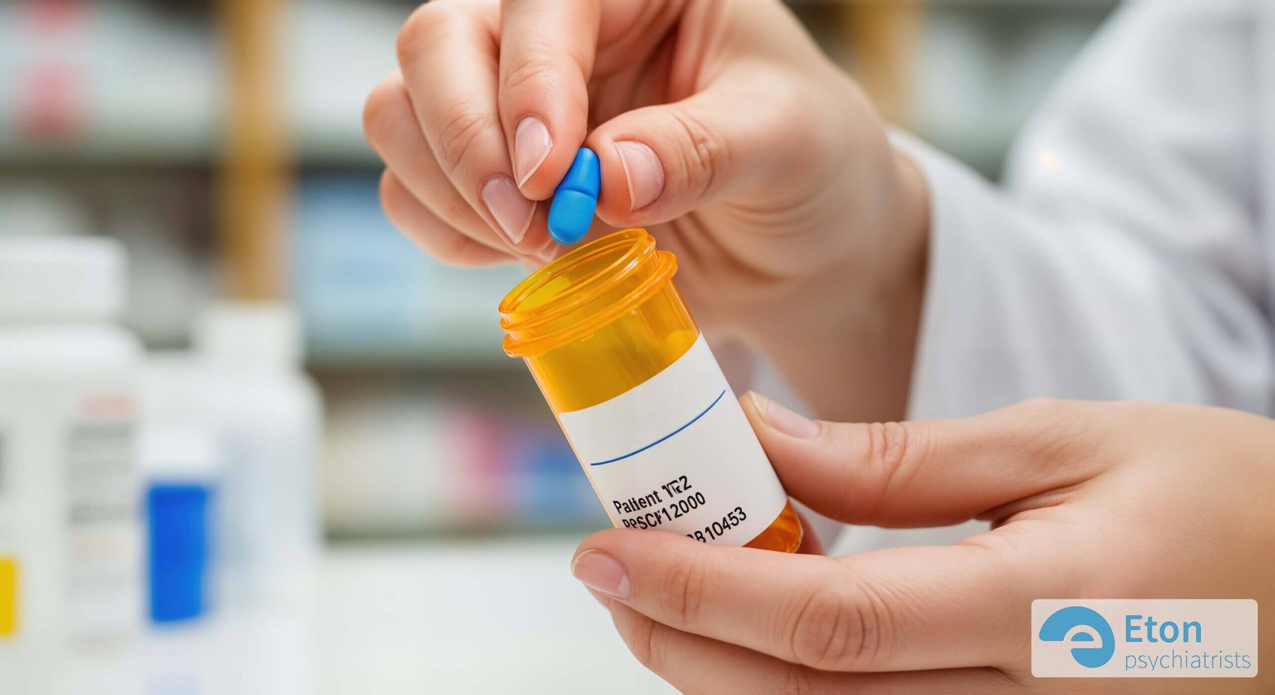 A close-up of a hand holding a single pill with a prescription bottle nearby, symbolizing safe and controlled ADHD medication.