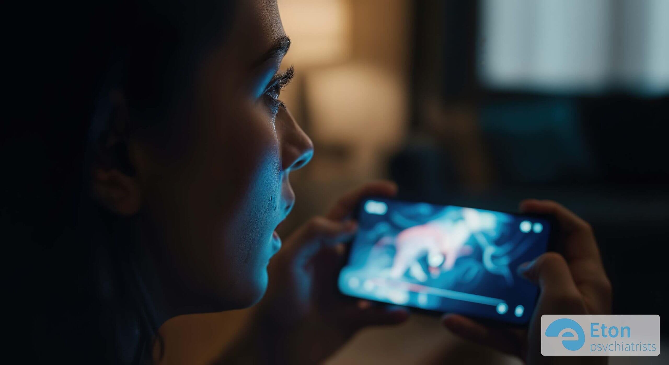 A person's face illuminated by their phone, showing a profound emotional realization, the 'lightbulb moment' of self-discovery online.